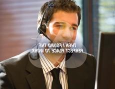 Man wearing headset talking on the phone